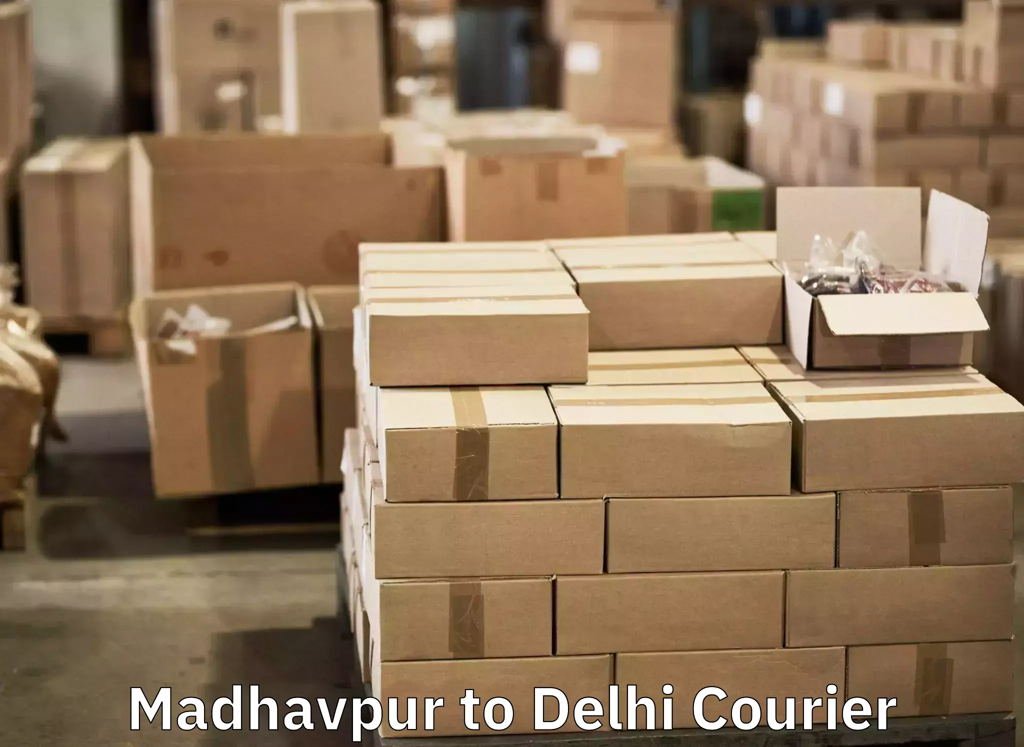 Luggage storage and delivery Madhavpur to East Delhi